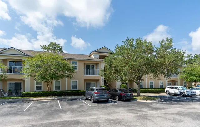 a car parked in front of a house
