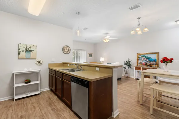 a kitchen with a stove and cabinets
