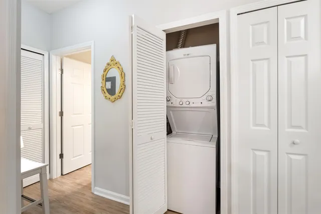 a close view of a utility room with dryer and washer
