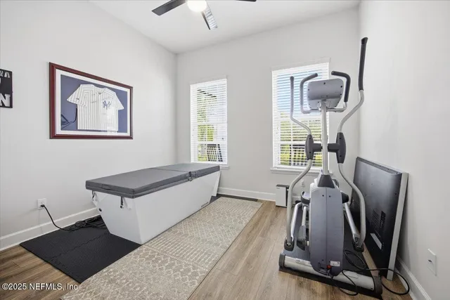 a view of a livingroom with furniture and windows