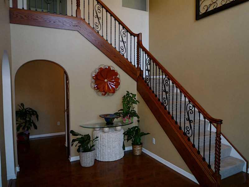 102 Stream View Court Sarver, PA 16055 - Photo 3 of 25 Entry/Foyer. Another view of the spacious entry, showcasing the custom wood work and solid wrought iron hand rails.