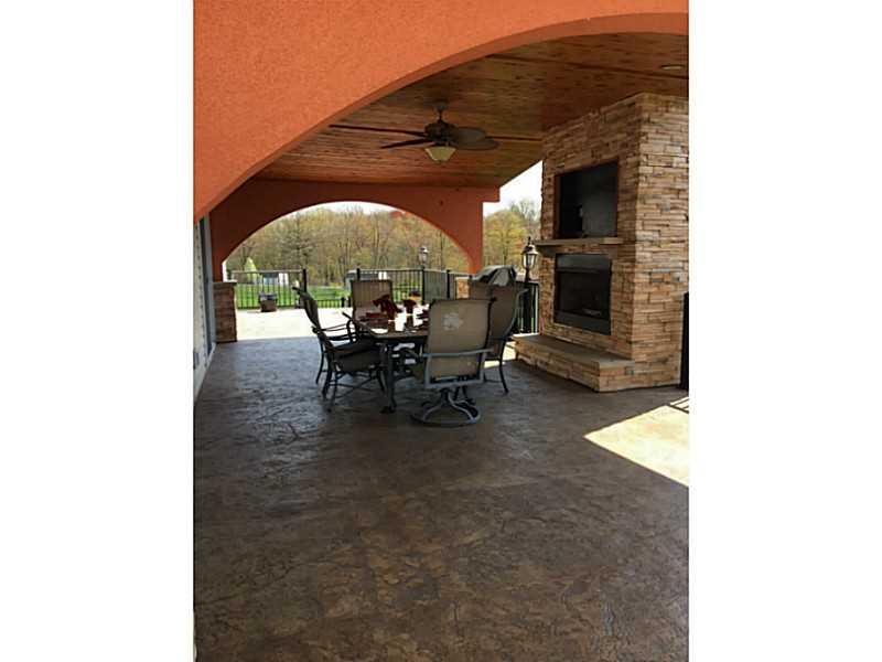 102 Stream View Court Sarver, PA 16055 - Photo 24 of 25 Exterior Back. The focal point of both patios are the gas fireplaces featuring custom stone work. They are hard wired for tv too!