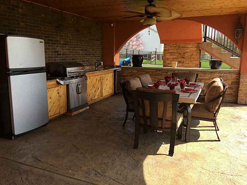 102 Stream View Court Sarver, PA 16055 - Photo 25 of 25 Exterior Back. The lower level patio has a complete outdoor kitchen!