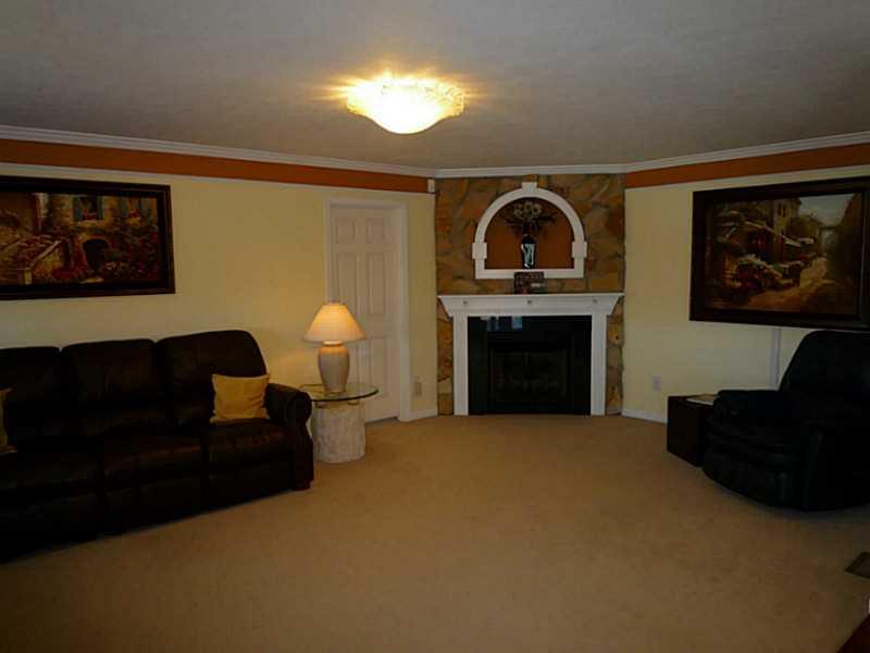 102 Stream View Court Sarver, PA 16055 - Photo 4 of 25 Great Room. The great room is adjacent to the kitchen. All of the gas fireplaces feature custom stone work.