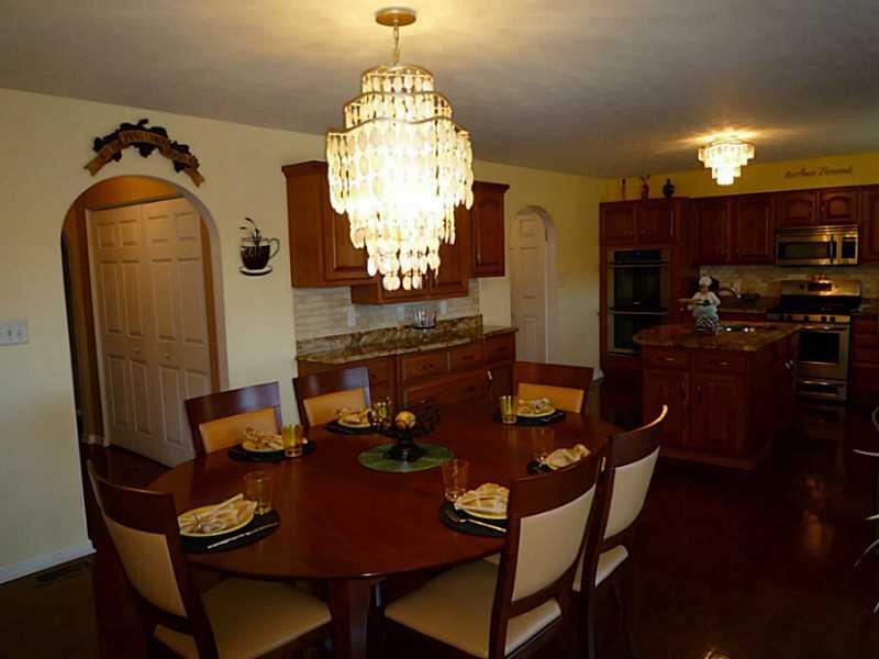 102 Stream View Court Sarver, PA 16055 - Photo 6 of 25 Kitchen. The eat in area is adjacent to the upper patio and great room.