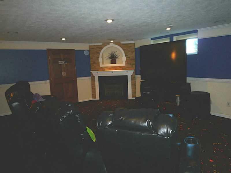 102 Stream View Court Sarver, PA 16055 - Photo 9 of 25 Family Room. The huge family room is set up as a home theater. The specialty carpet is so fun and glows under black light!