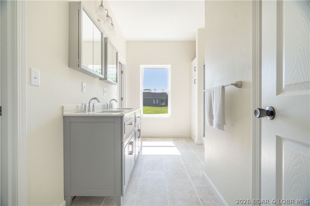 7 Oak Tree Lane Eldon, MO 65026 - Photo 25 of 59 Master bathroom