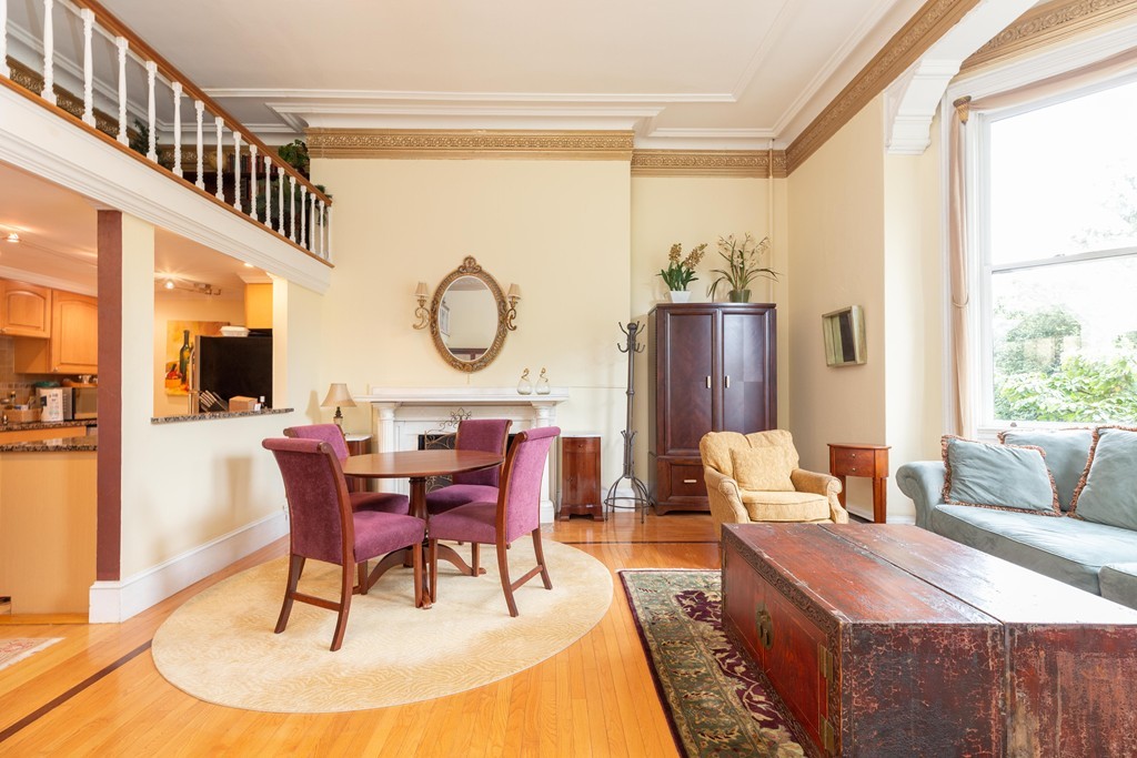64 Commonwealth Avenue, Unit 3 Boston, MA 02116 - Photo 3 of 10 a view of a dining room with furniture window and wooden floor