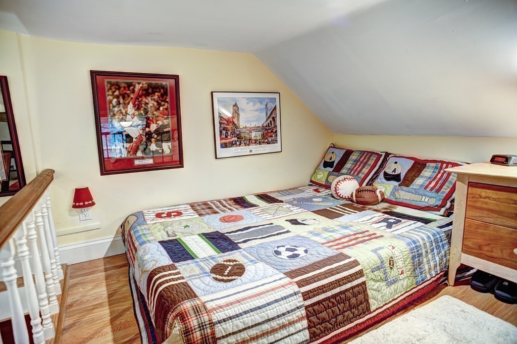 64 Commonwealth Avenue, Unit 3 Boston, MA 02116 - Photo 10 of 10 a bedroom with a bed and cupboard