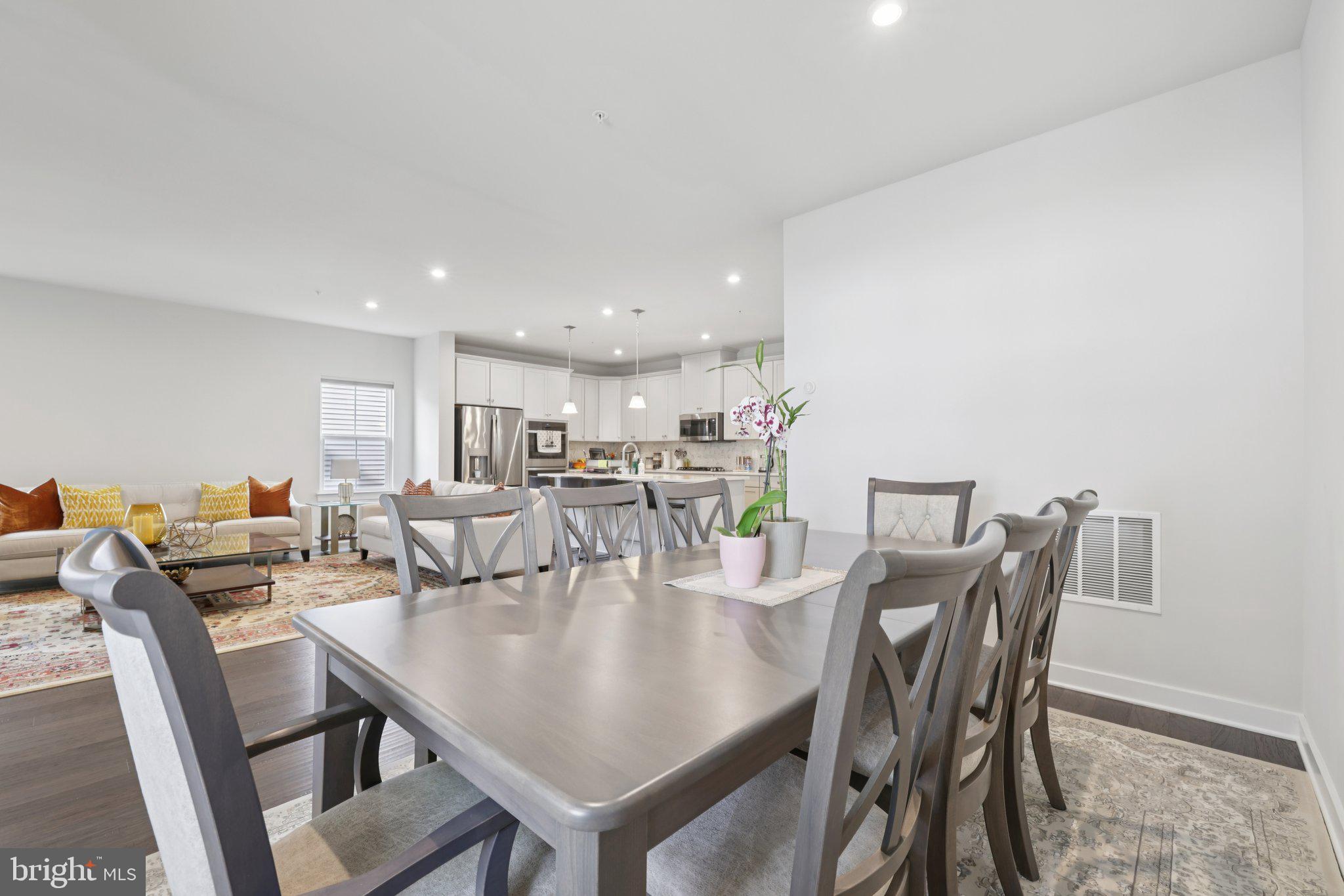 6604 River Birch Road Frederick, MD 21703 - Photo 14 of 58 a view of a dining room with furniture