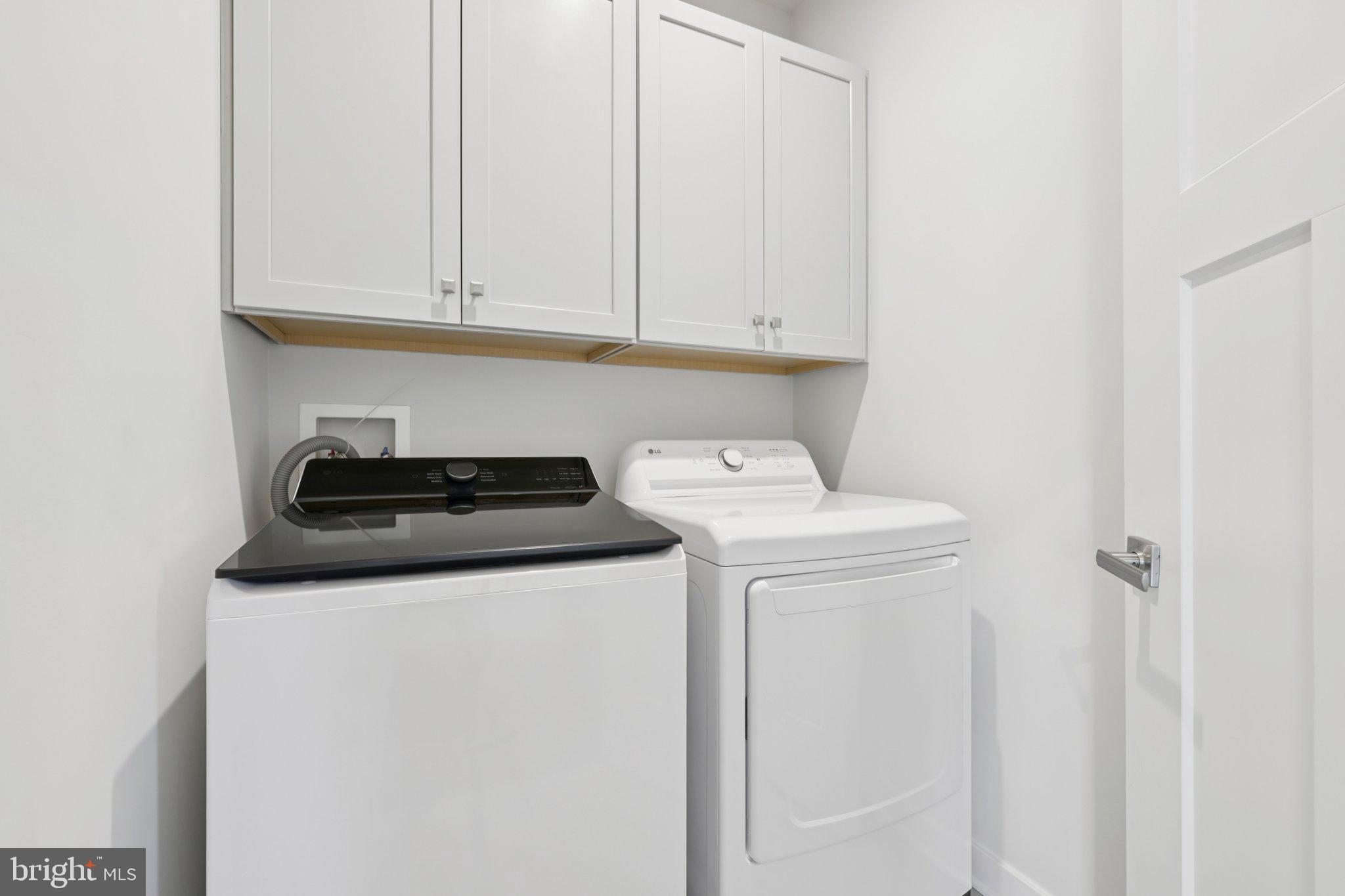 6604 River Birch Road Frederick, MD 21703 - Photo 38 of 58 a utility room with dryer and washer