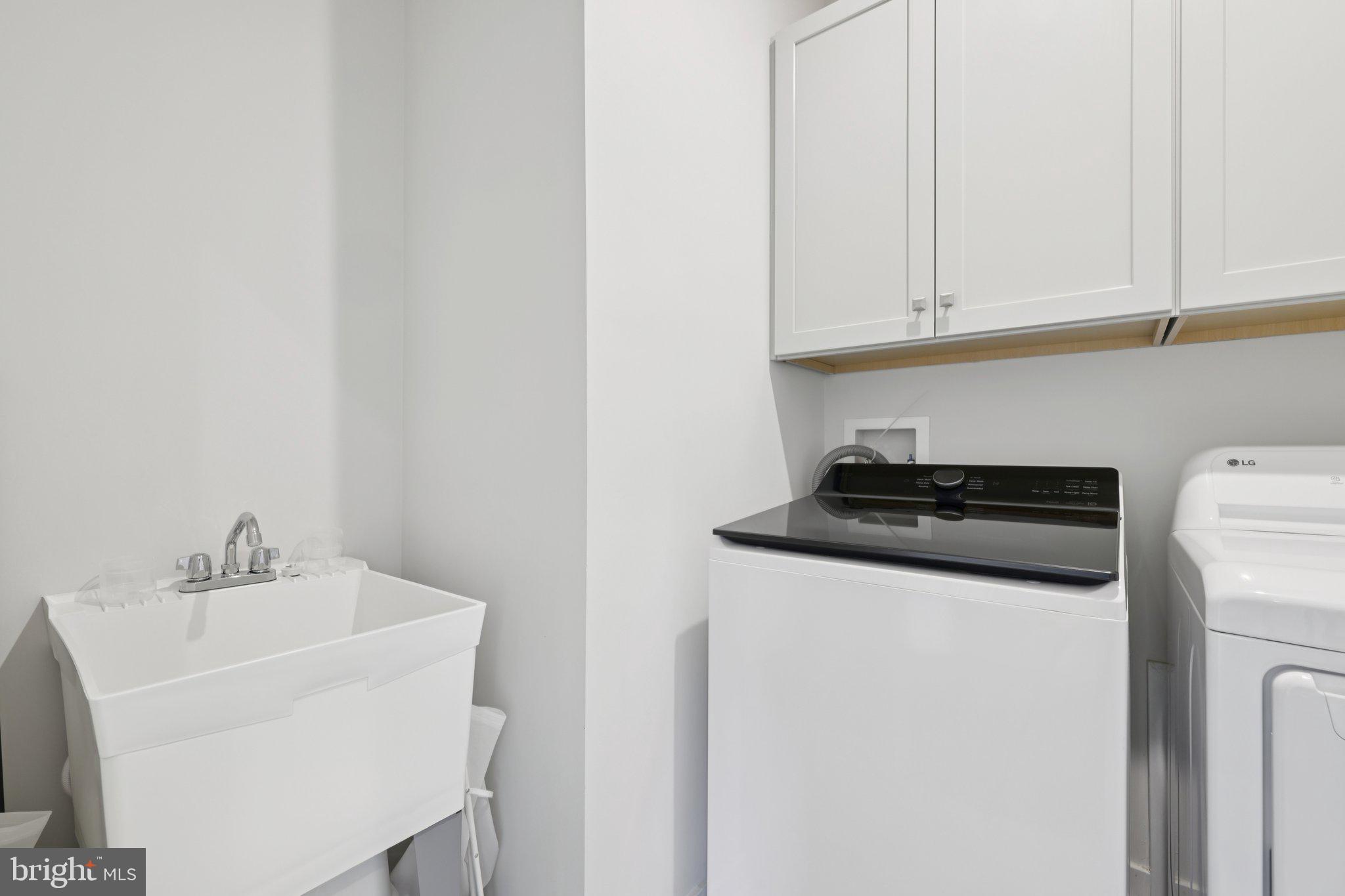 6604 River Birch Road Frederick, MD 21703 - Photo 39 of 58 a white stove top oven sitting inside of a kitchen