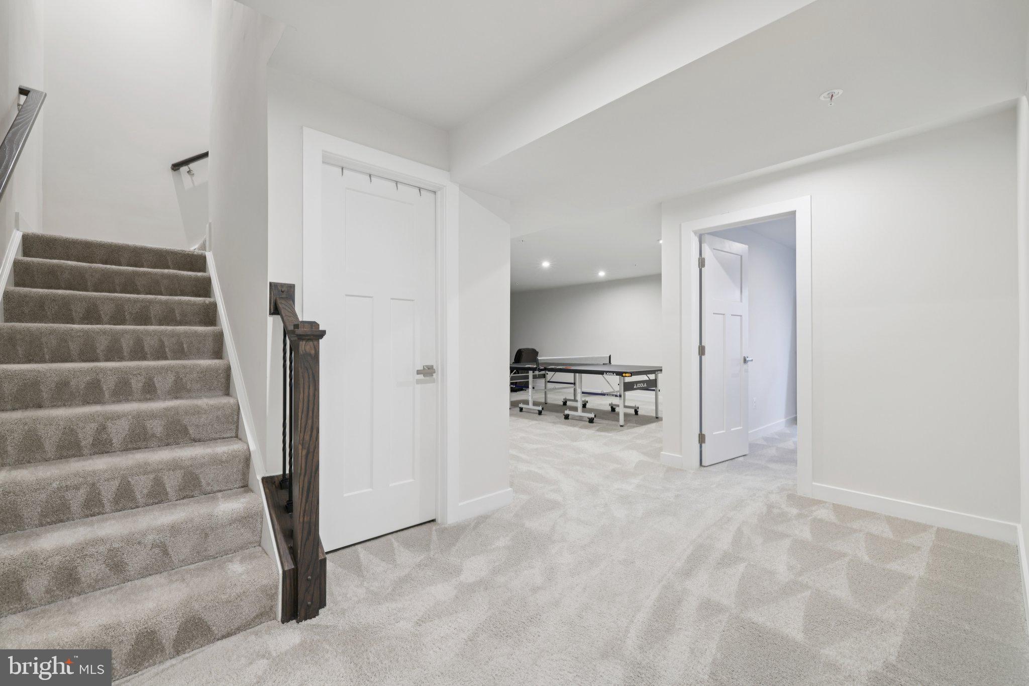 6604 River Birch Road Frederick, MD 21703 - Photo 40 of 58 a view of staircase with white walls