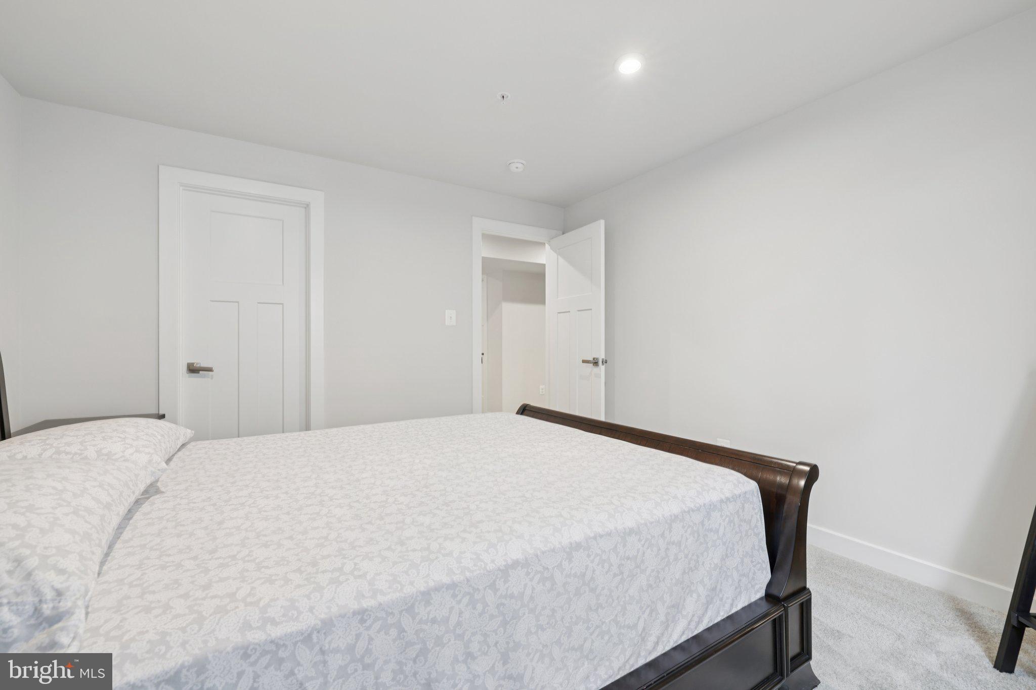6604 River Birch Road Frederick, MD 21703 - Photo 49 of 58 a bedroom with a bed and a window