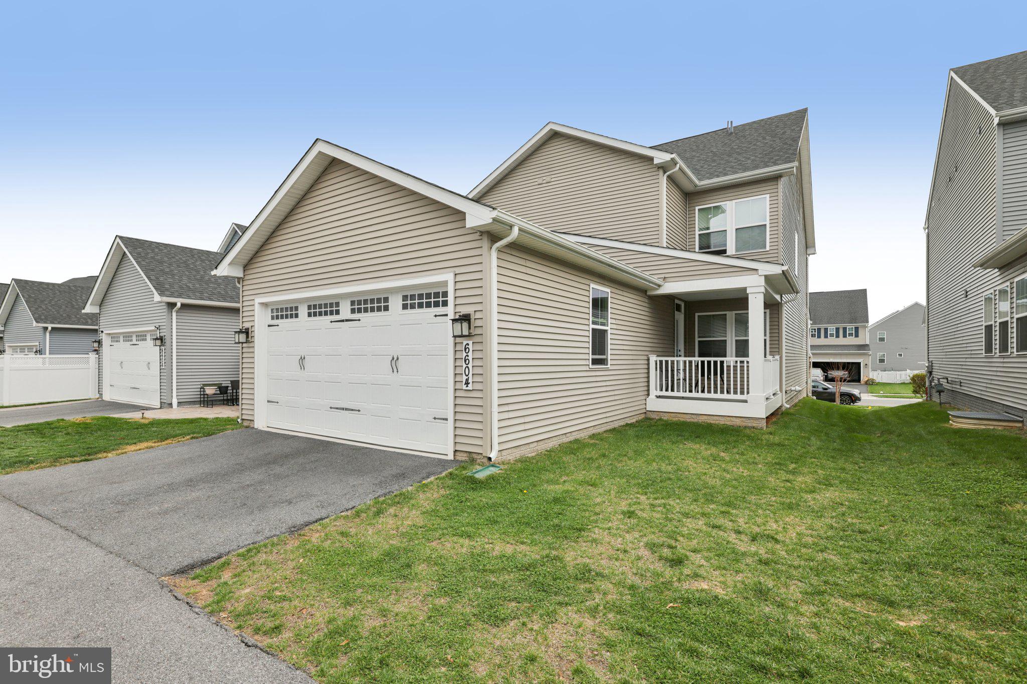 6604 River Birch Road Frederick, MD 21703 - Photo 52 of 58 a view of a house with a yard