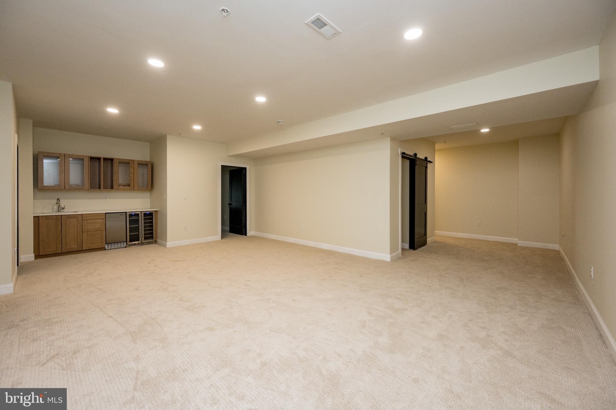 2045 Swallow Falls Road Oakland, MD 21550 - Photo 58 of 79 Lower level living area 2 with wet bar