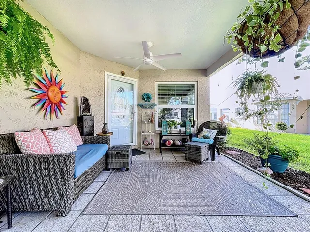 a outdoor living space with furniture and garden view