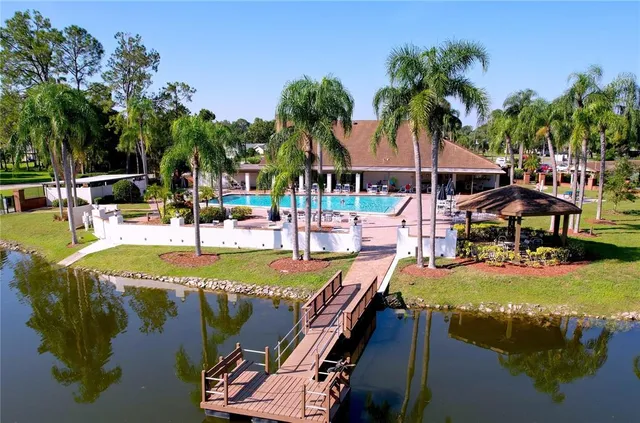 a view of a swimming pool with a patio