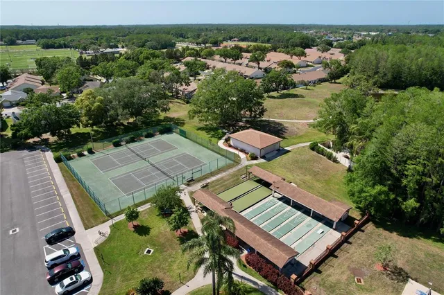an aerial view of a house with a garden