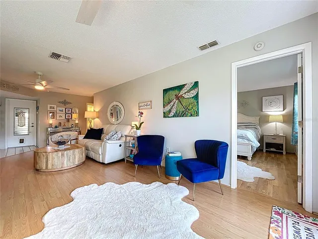a living room with furniture and a view of living room