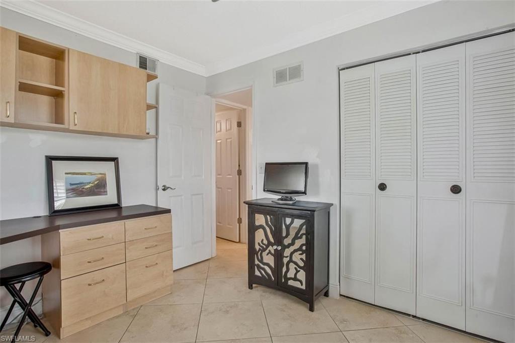 4318 27th Court Southwest, Unit 101 Naples, FL 34116 - Photo 13 of 19 work station