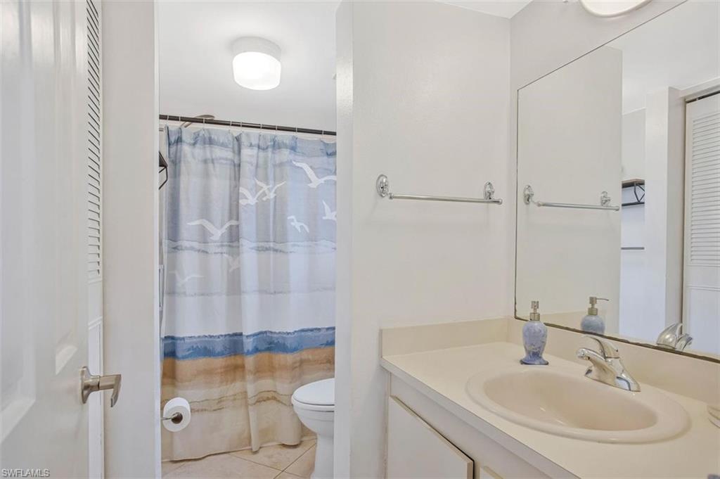 4318 27th Court Southwest, Unit 101 Naples, FL 34116 - Photo 15 of 19 Step in shower