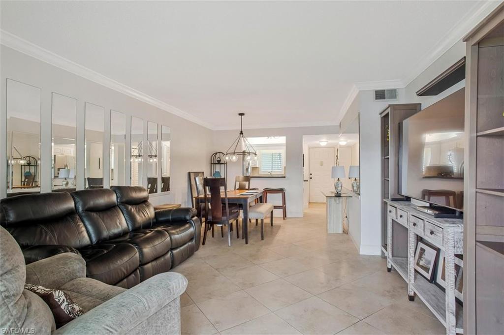 4318 27th Court Southwest, Unit 101 Naples, FL 34116 - Photo 4 of 19 tile floors comfy furniture