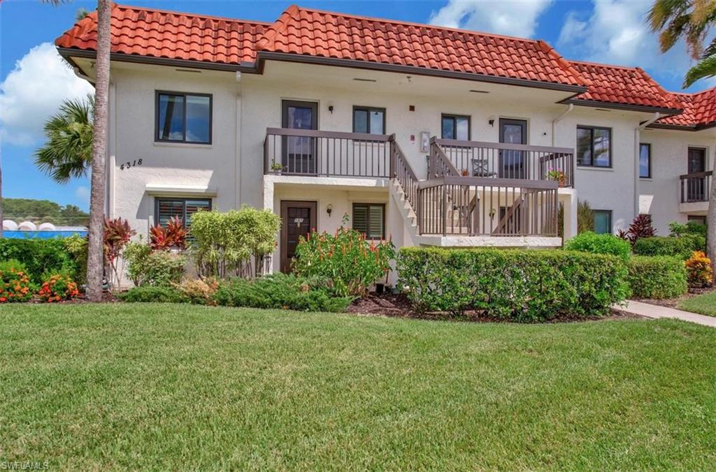 4318 27th Court Southwest, Unit 101 Naples, FL 34116 - Photo 6 of 19 first floor end unit