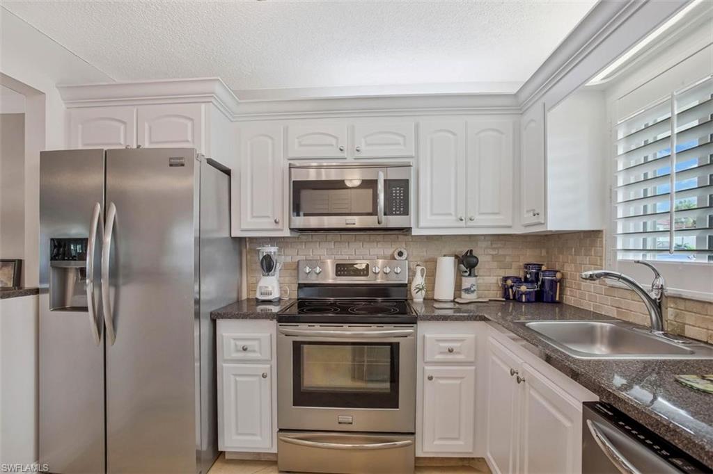 4318 27th Court Southwest, Unit 101 Naples, FL 34116 - Photo 9 of 19