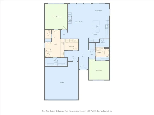 an aerial view of a house with garden space and street view