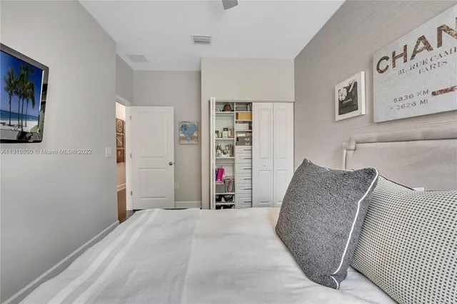 a view of a livingroom with furniture and a flat screen tv