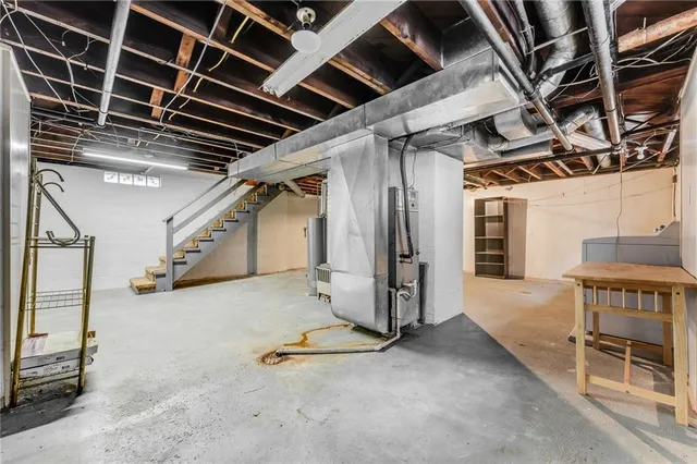 a view of an empty room with stairs