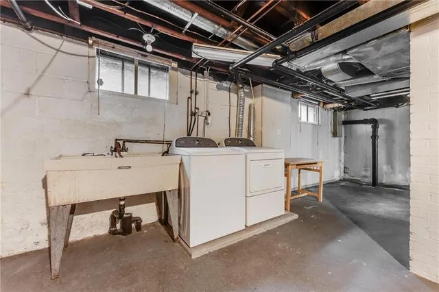 a utility room with dryer and washer