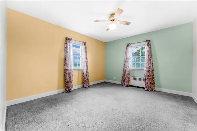 an empty room with windows