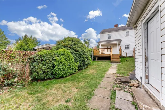 a view of a house with a garden