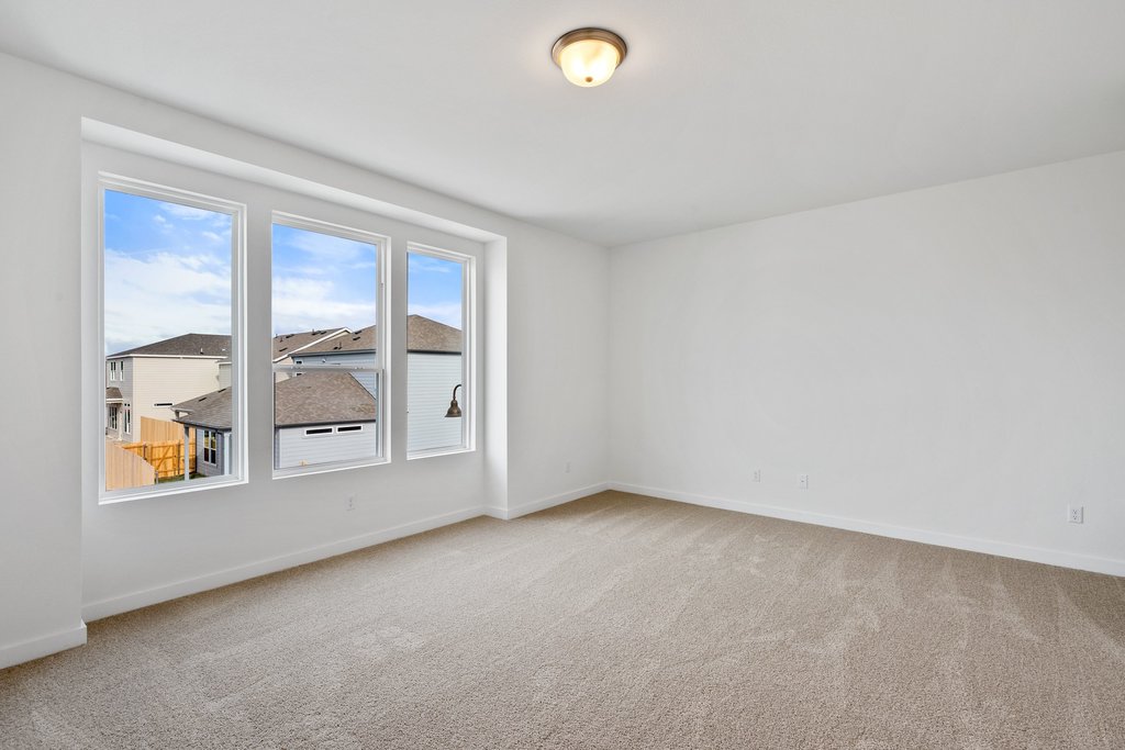 2205 Cento Walk Round Rock, TX 78664 - Photo 16 of 32 Empty room with light carpet