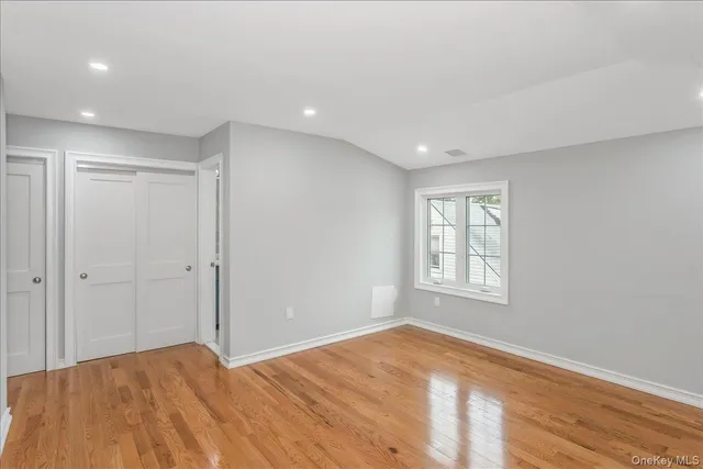 a bathroom with a granite countertop sink toilet tub and shower