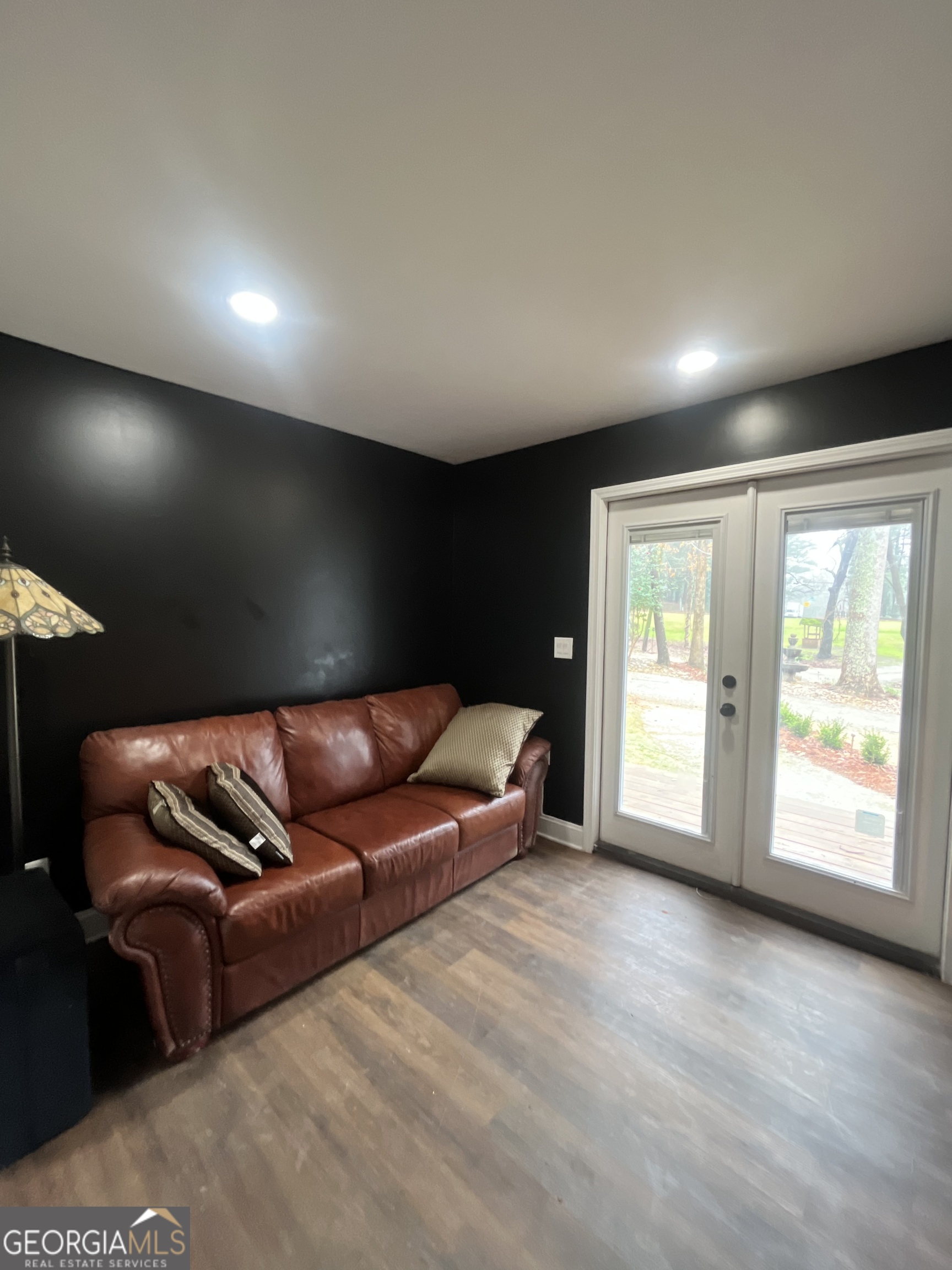4360 Stonewall Tell Road College Park, GA 30349 - Photo 13 of 49 a living room with furniture and a large window