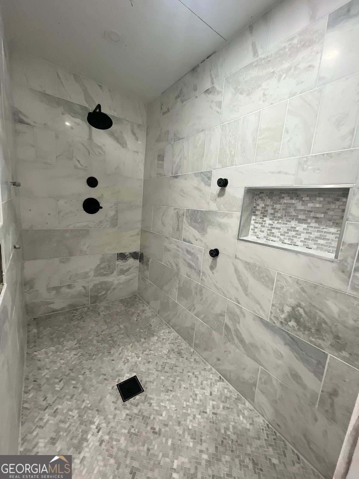 4360 Stonewall Tell Road College Park, GA 30349 - Photo 15 of 49 a bathroom with a shower