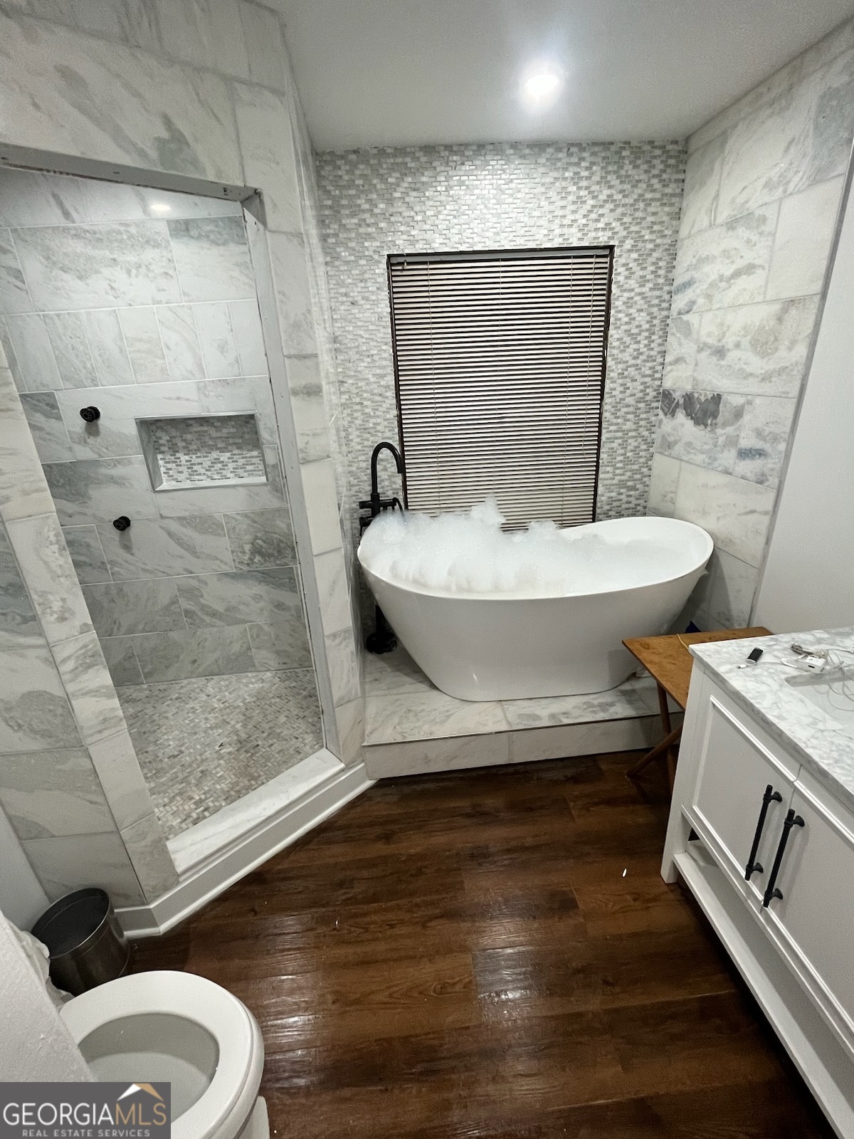 4360 Stonewall Tell Road College Park, GA 30349 - Photo 16 of 49 a bathroom with a sink and a mirror