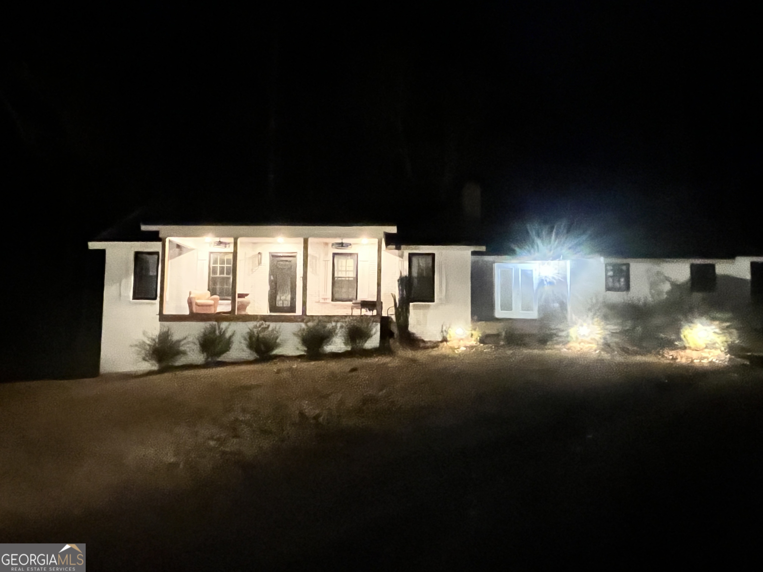4360 Stonewall Tell Road College Park, GA 30349 - Photo 26 of 49 a black and white photo of a house