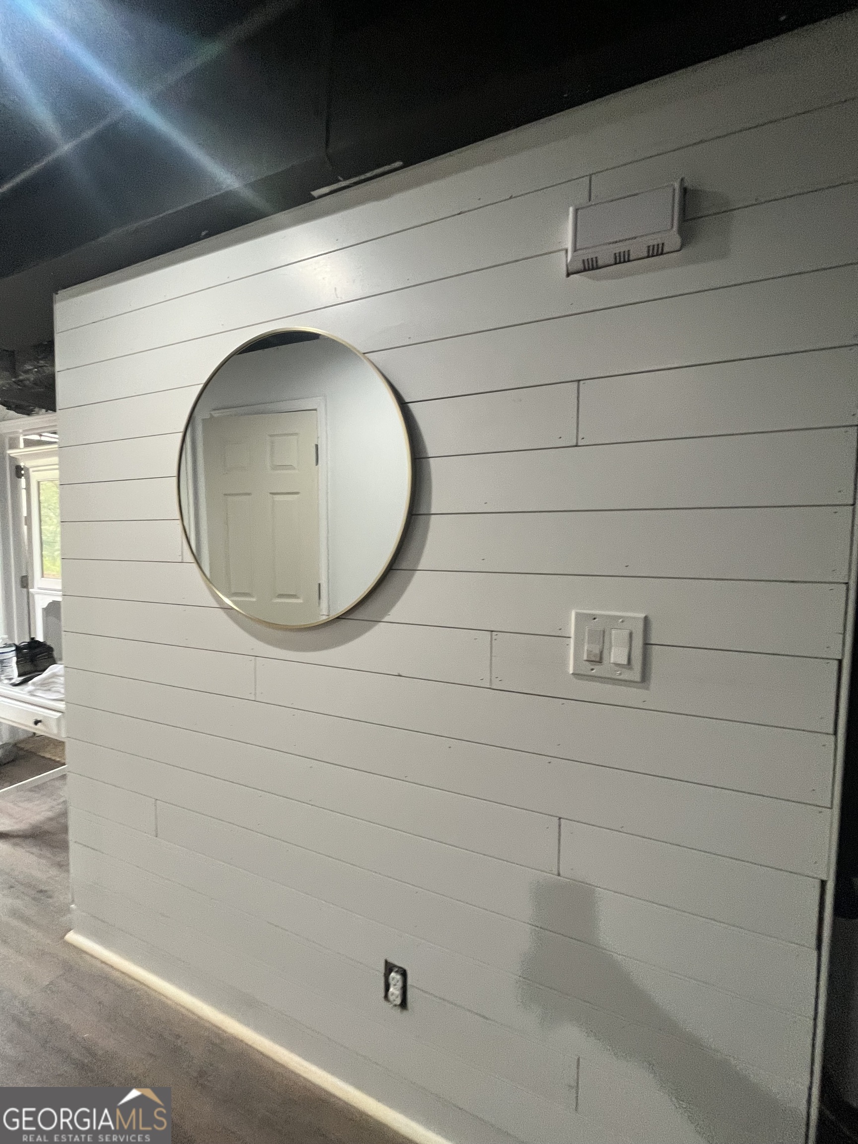 4360 Stonewall Tell Road College Park, GA 30349 - Photo 45 of 49 a bathroom with a sink and a mirror