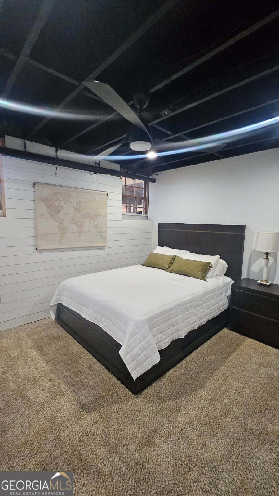 4360 Stonewall Tell Road College Park, GA 30349 - Photo 46 of 49 a bedroom with a bed and a dresser