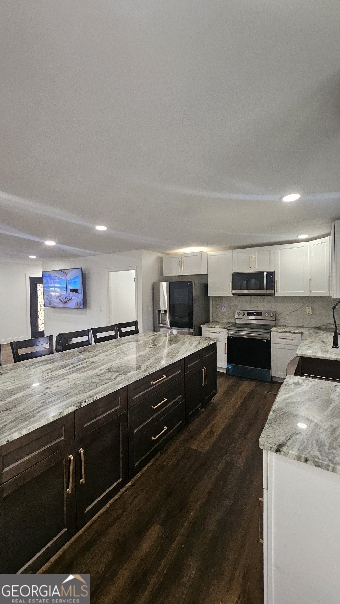 4360 Stonewall Tell Road College Park, GA 30349 - Photo 6 of 49 a large kitchen with a stove and a sink