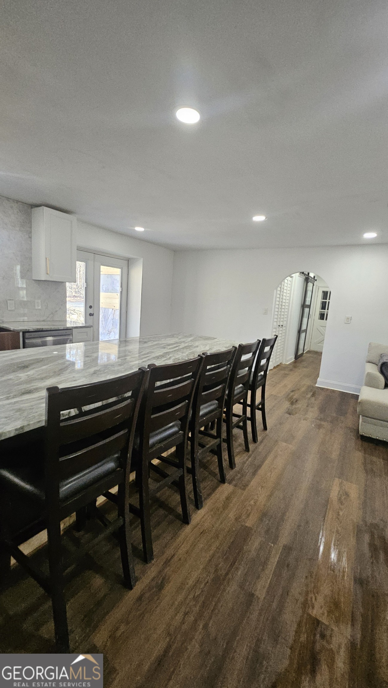 4360 Stonewall Tell Road College Park, GA 30349 - Photo 8 of 49 a kitchen with a table and chairs in it