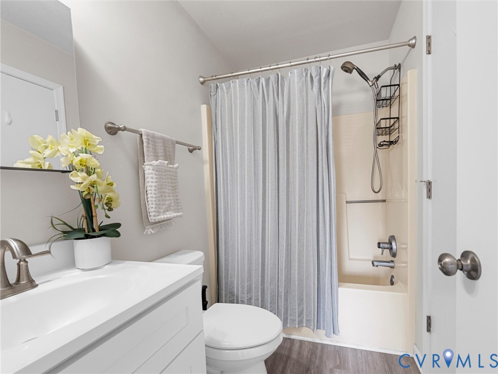 12206 Timber Trail Drive Midlothian, VA 23112 - Photo 24 of 40 a bathroom with a sink toilet and shower