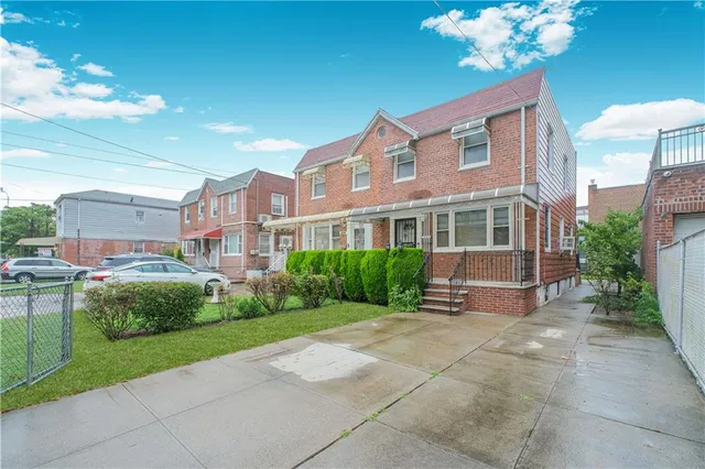 a view of a building with a garden