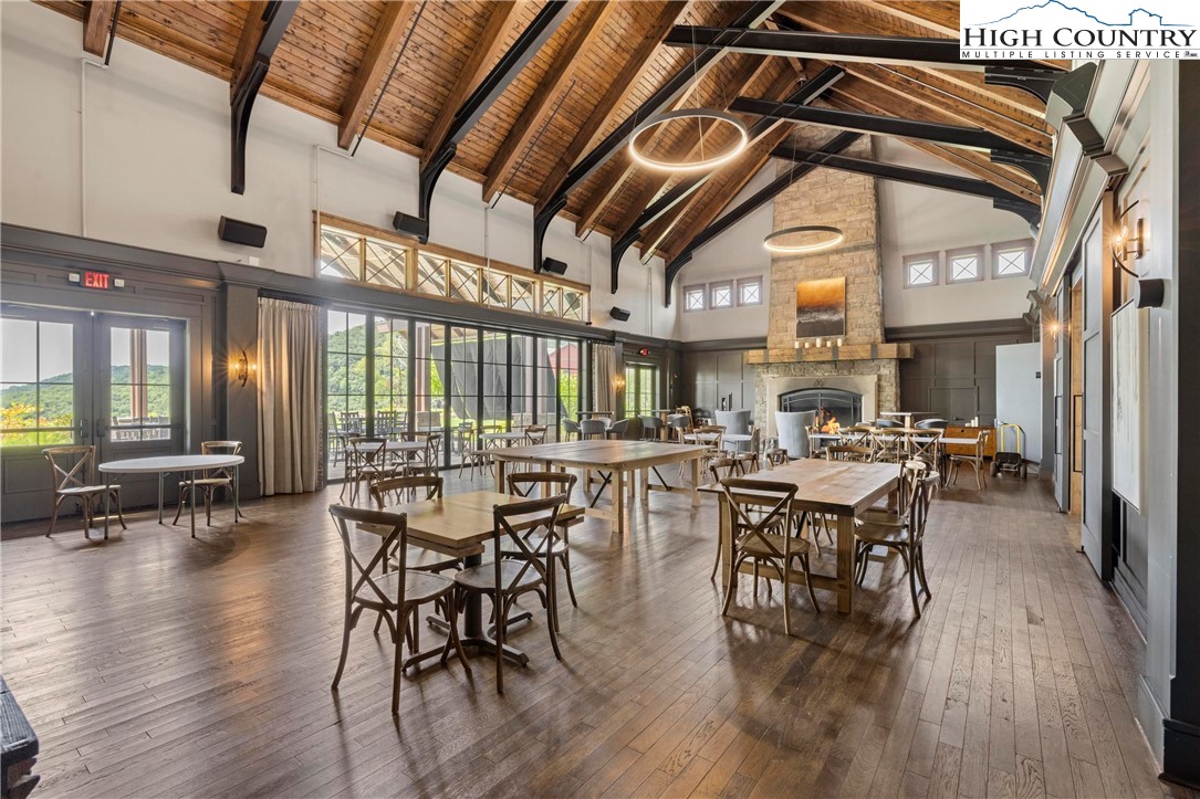 Lot 23 Bluebell Trail Boone, NC 28607 - Photo 29 of 37 a view of a dining room with furniture window and wooden floor