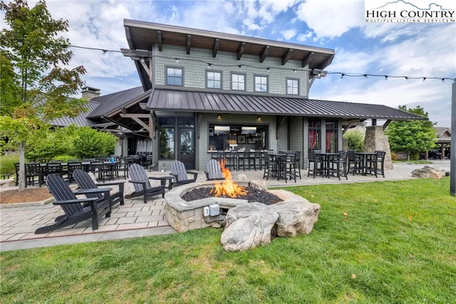 a view of swimming pool with a yard