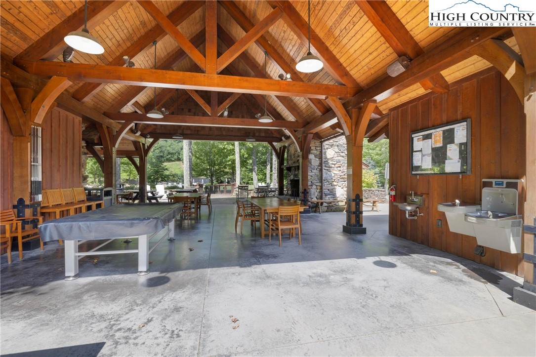 Lot 23 Bluebell Trail Boone, NC 28607 - Photo 34 of 37 an outdoor space with the couches and dining table with the view of city